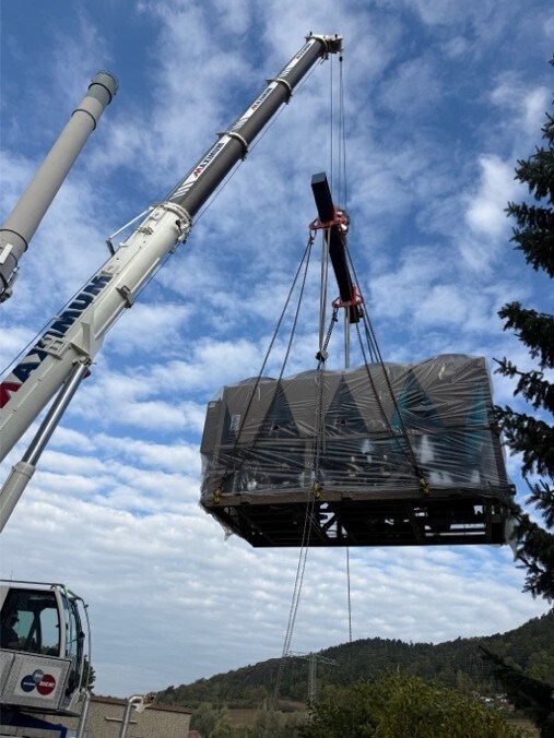 Transporting heatpump with crane