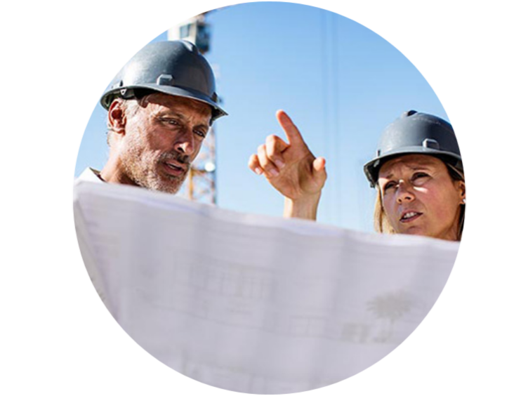 Close-up of two architects discussing the floor plan