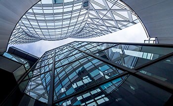 Frog's-eye view of glass commercial buildings